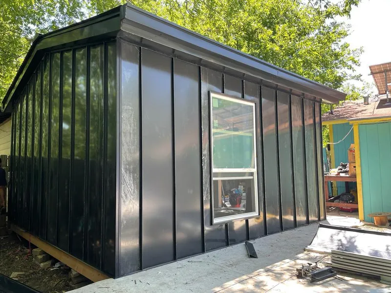 Black standing seam metal wall panels for Metal Roof Installation in Crawford