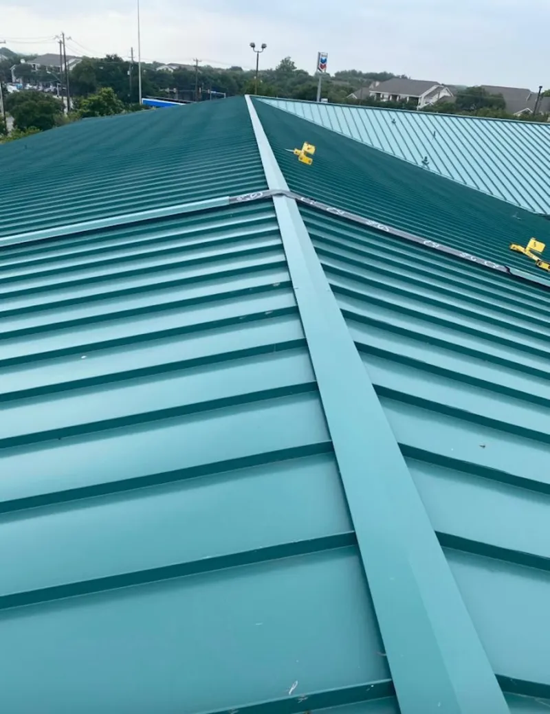 Green commercial metal roof ridge and valley for Metal Roof Repair in Crawford